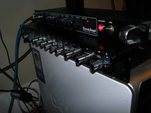 An earlier version of my current setup, pre desk, while tracking bass for Zero Mantra