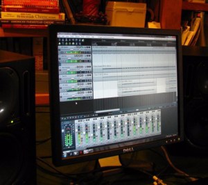 A Reaper project open, on my old PC, set up in my parents' library while I was tracking rhythm guitars for 